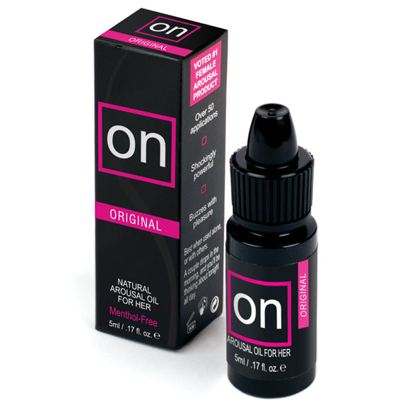 The bottle of the On Natural Arousal Oil - Original next to the box packaging that it comes in. | Kinkly Shop