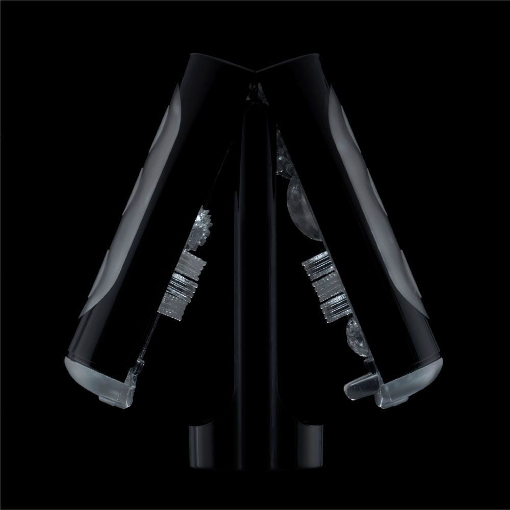 The Tenga Flip Hole in black spread open, resting on top of its drying stand, showcasing how the entire interior has access to air flow, drying the stroker much faster. | Kinkly Shop