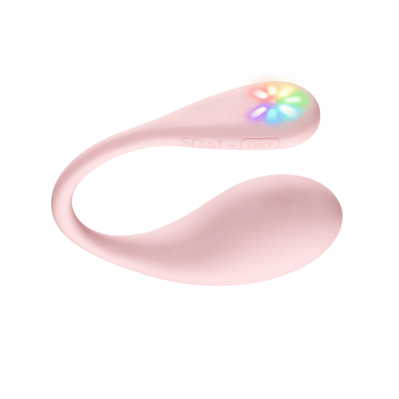 KIIROO Spot in front of a plain white background. The vibrator has an egg-shaped design with a long, thin tail. On the end of the tail is a sunflower-esque design of multiple LED color lights. | Kinkly Shop