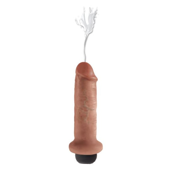 The King Cock 6" Squirting in Tan shown squirting out the tip of the dildo. | Kinkly Shop