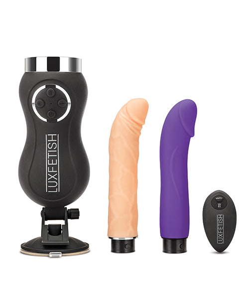 The Lux Fetish Remote-Controlled Rechargeable Compact Thrusting Machine with everything that comes with it. There's the thrusting machine base, two tips, and the wireless remote. | Kinkly Shop