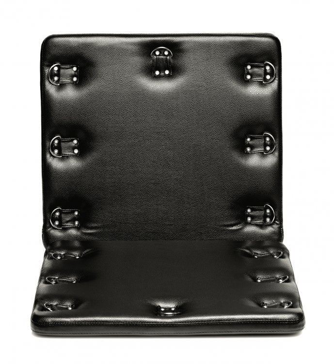 The Strict Bondage Board bend in the bendable middle. This showcases the board's foldable design and all of the D-ring placement around the edges of the Strict Bondage Board. | Kinkly Shop