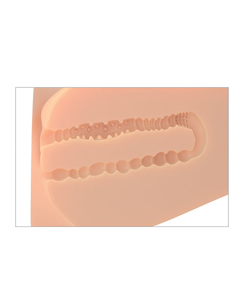 Cross-section of the internal stroker tunnels inside of the EZ Bang Torso. The vaginal and anal tunnels are differently textured and have different tightnesses. | Kinkly Shop