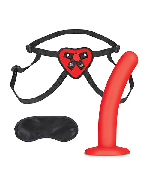 Everything included with the Lux Fetish Red Heart Strap-On Set. It includes the strap-on harness, the red dildo, and an elastic blindfold. | Kinkly Shop