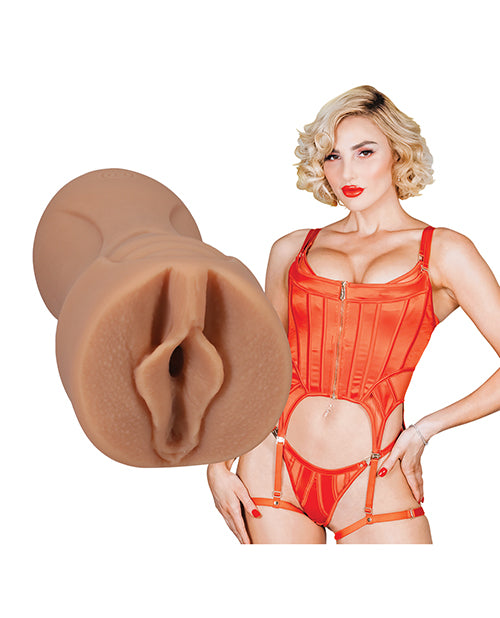 Kenzie shown next to the Signature Strokers - Kenzie Anne. The vulva orifice of the stroker is molded directly off of Kenzie's own vulva. | Kinkly Shop