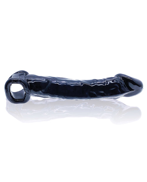 The underside of the Oxballs Muscle Ripped. The extender is extremely realistic is a long, veiny shaft and pronounced, circumsized head. The black color is a midnight black and not realistic for most. | Kinkly Shop