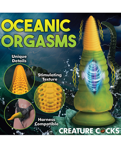 Collage of images showcasing the dildo's features including unique detailing, stimulating textures, and harness compatibility. An XRay of the dildo shows that the motor is located about 2/3rds of the way down the shaft of the dildo. | Kinkly Shop