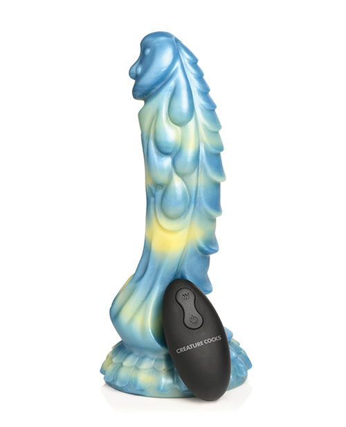 Creature Cocks Sea Stallion with Remote with the remote leaning against the shaft. | Kinkly Shop