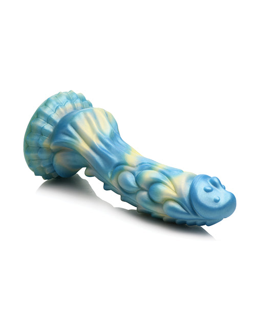 Creature Cocks Sea Stallion with Remote laying on its side. This really showcases the water droplet textures on the side of the shaft and head of the dildo. | Kinkly Shop