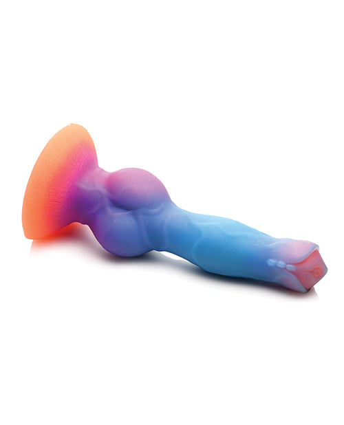 The Creature Cocks Space Cock lays on its side. This angle makes it easy to see how thick the knot is and the unique triple-beaded design near the frenulum. | Kinkly Shop