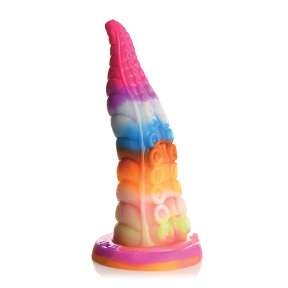 Creature Cocks Luminoctopus in front of a plain white background. The dildo is made up of a lot of different colors. | Kinkly Shop