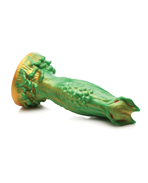 The Creature Cocks Nebula laying on its side. It has a very thick diameter near the middle of the shaft. | Kinkly Shop