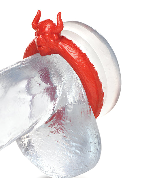 Close-up of the Creature Cocks Beast Mode worn on the base of a clear realistic dildo. The cock ring is being worn underneath the dildo's shaft and balls. | Kinkly Shop