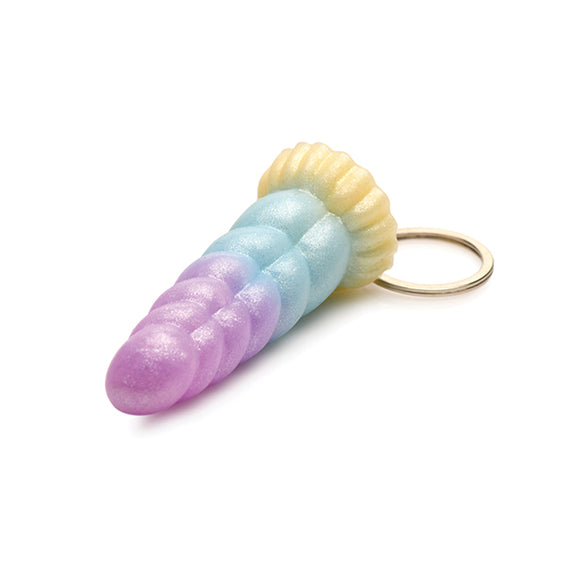Close up of the shaft of the Creature Cocks Mystique Unicorn Key Chain. It has a ripped texture that looks like a unicorn horn with the same beautiful spring-color ombre along the shaft. | Kinkly Shop