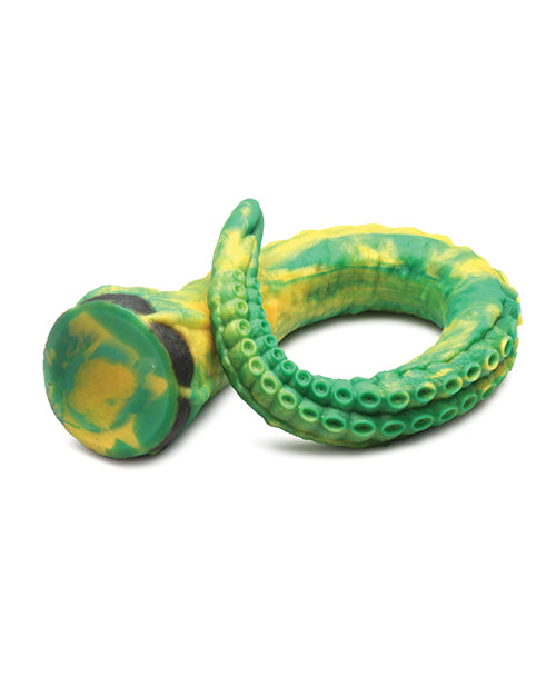 The Creature Cocks Titan wrapped in on itself, showcasing how thin the tip of the dildo is for easier insertion. | Kinkly Shop