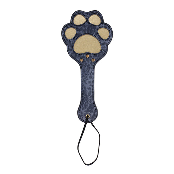 The Sportsheets Cougar Paw Paddle in front of a plain white background | Kinkly Shop