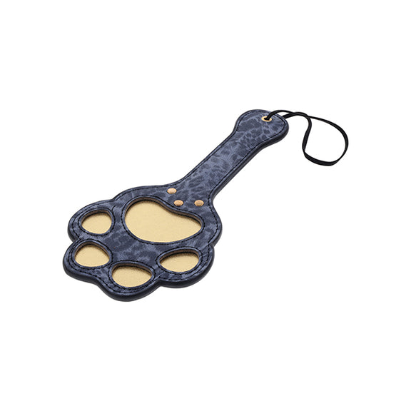 Angled view f the Sportsheets Cougar Paw Paddle showcases the cut-out design of the paw print that will leave an imprint on the skin when spanked. | Kinkly Shop