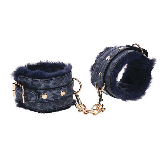 Sportsheets Cougar Fur Wrist Cuffs in front of a plain white background | Kinkly Shop