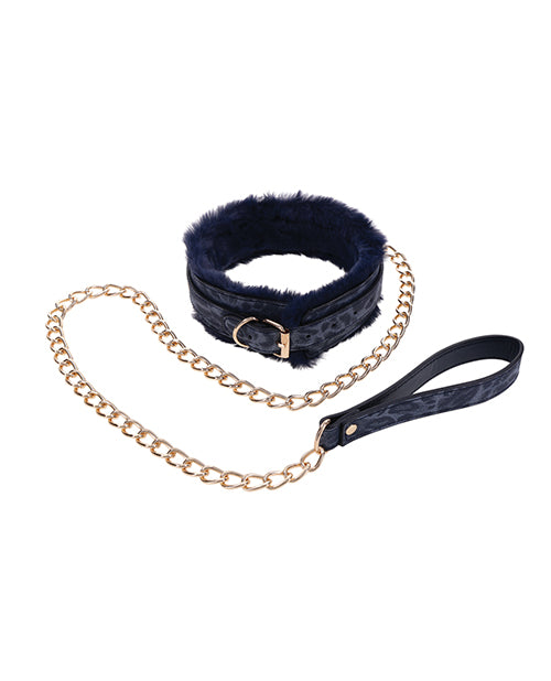 The backside of the Sportsheets Cougar Fur Collar & Leash. The collar has matching gold hardware with a standard fastening buckle. The leash matches in material color and metal. | Kinkly Shop
