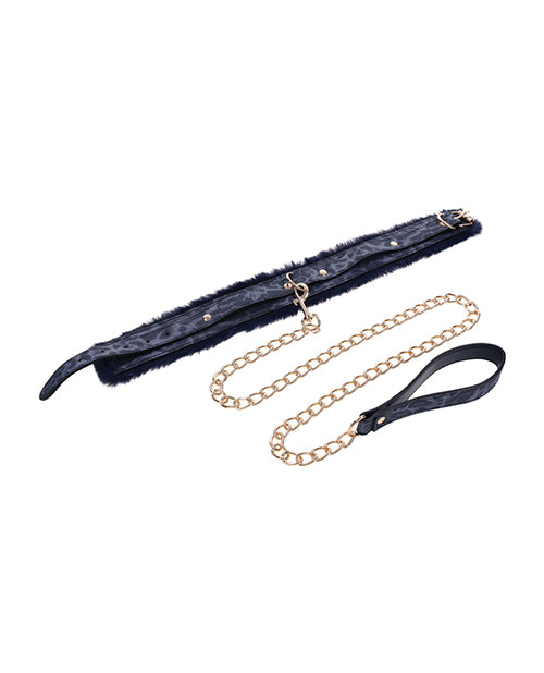 The Sportsheets Cougar Fur Collar & Leash collar laid flat with the leash attached. The collar looks like it has very plushy faux fur on the inside for the wearer. | Kinkly Shop
