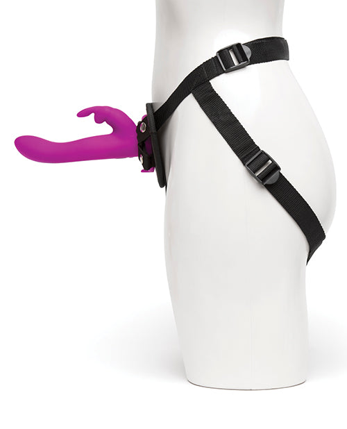 Side view of the person wearing the Happy Rabbit Strap On Harness Set. The rabbit vibrator protrudes very far from the base of the harness. | Kinkly Shop