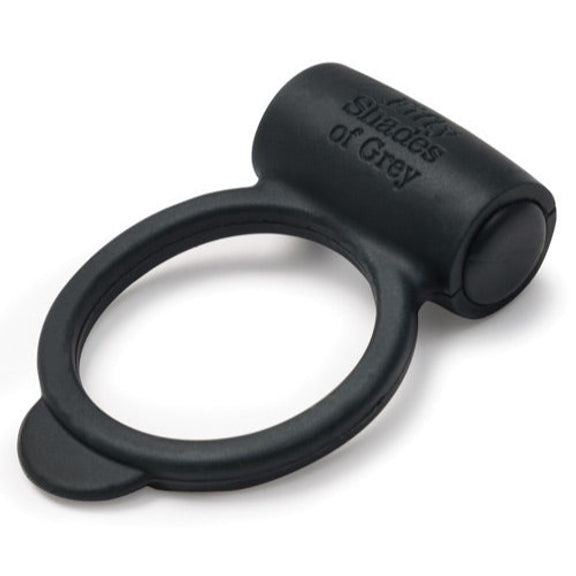 Fifty Shades of Grey Yours and Mine lays out on a plain white background. The bottom of the cock ring includes a small pull tab to make it easier to grip while using it. | Kinkly Shop