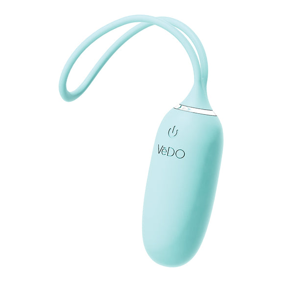 Close-up on the VeDO Kiwi insertable vibrator. The silicone "tail" loop is bent sideways, showcasing how flexible and comfortable the soft, movable material of the tail is. | Kinkly Shop