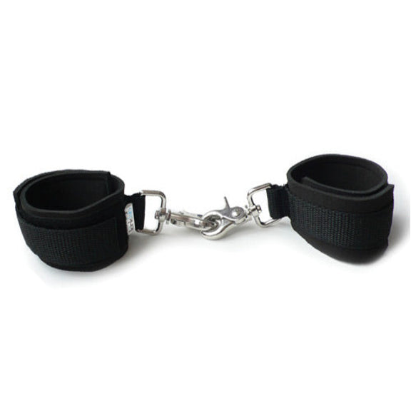 Kinklab Neoprene Cuffs in front of a plain white background. The claw-style clasps that are unremovable from each cuff are attached to one another. | Kinkly Shop