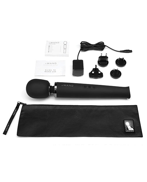 Everything included with the Le Wand Rechargeable Wand in Black. There's the power cord, the converter electrical plates, the instruction manual, the guide to use it, the wand massager itself, and a zippered storage pouch to store it all in. | Kinkly Shop