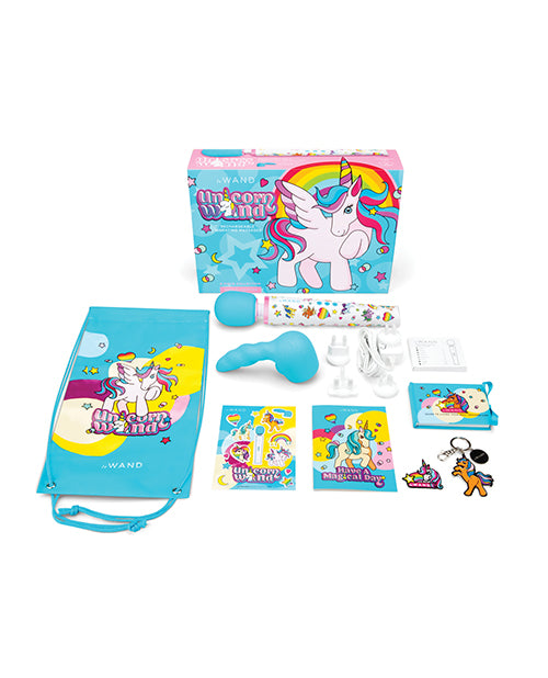 Everything included in the Le Wand Unicorn Wand Set. There's the drawstring backpack, the included attachment, the stickers, the postcard, the keychain, the instruction manual, the wand itself, and the charger with multiple electrical plates to work with different regions. | Kinkly Shop