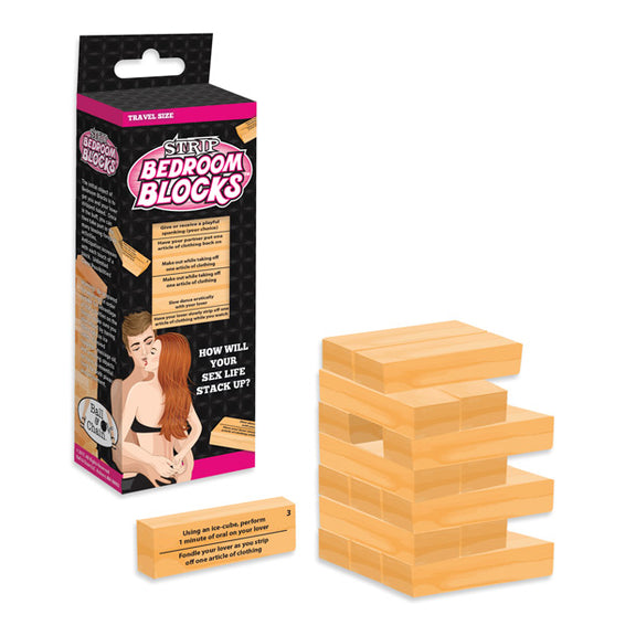The tower of Strip Bedroom Blocks shown being built in front of the packaging that houses all of the blocks. | Kinkly Shop