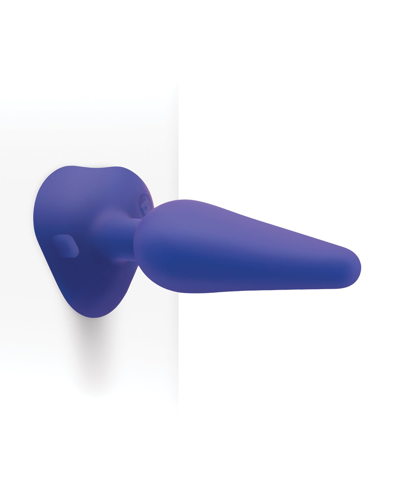 The b-Vibe Anal Training 3-Piece Kit shown suction cupped onto a wall, showcasing how the suction cup bases work. | Kinkly