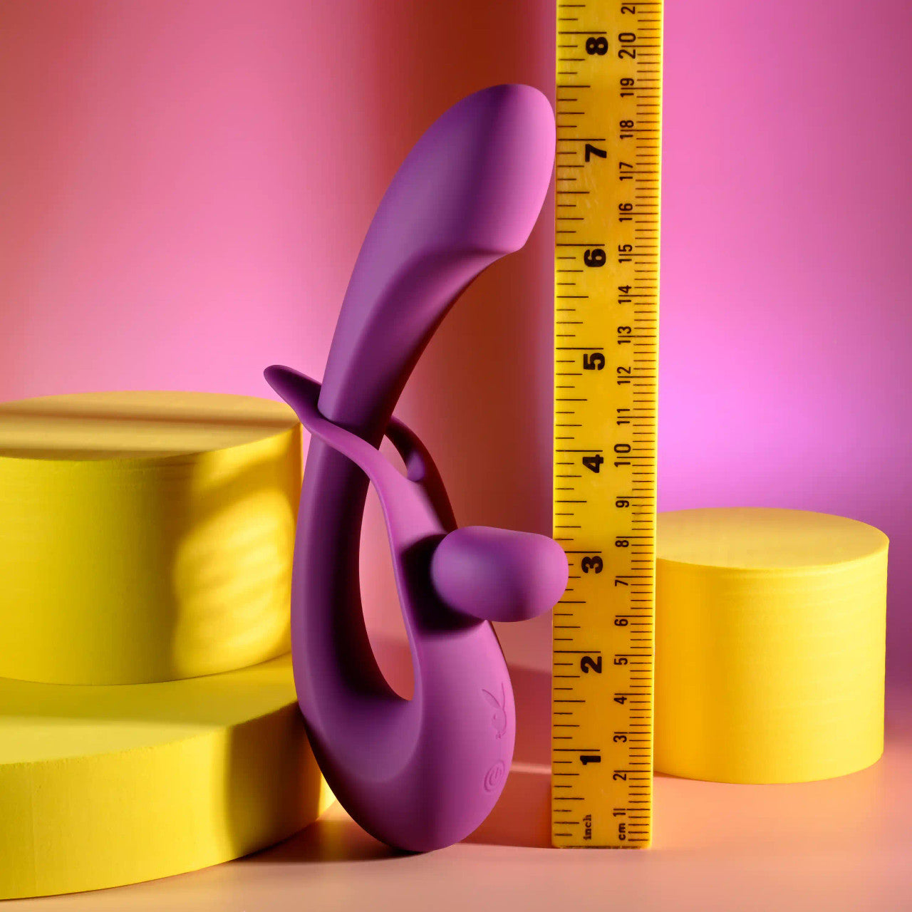 The Playboy Cha Cha Slide shown next to a yellow measuring tape. It's 7.5" in total height. | Kinkly