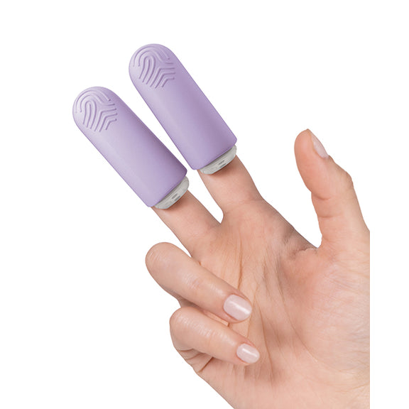A hand wears the two vibrators of the JimmyJane Hello Touch Pro on their pointer and middle fingers. The vibrators fit overtop of the tip of the fingers like a cap. | Kinkly