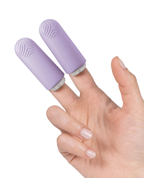 A hand wears the two vibrators of the JimmyJane Hello Touch Pro on their pointer and middle fingers. The vibrators fit overtop of the tip of the fingers like a cap. | Kinkly