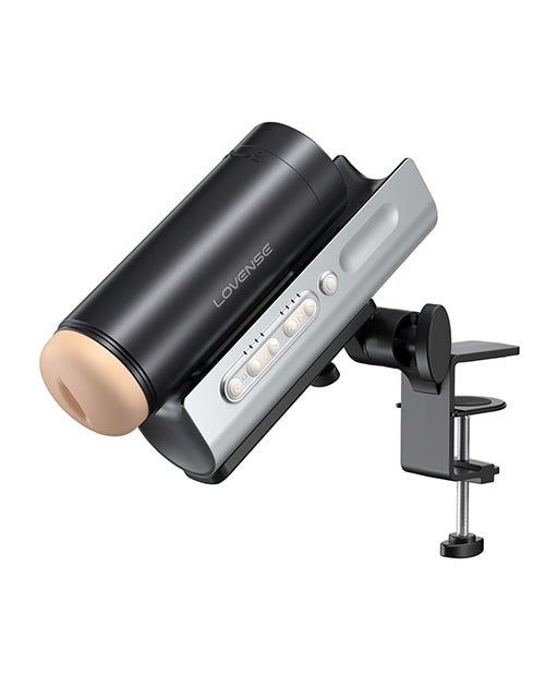 The Lovense Solace Pro shown at a downward angle, showcasing the hands-free design that the table mount allows. | Kinkly