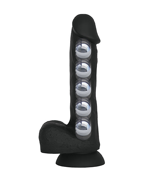 X-Ray shows weighted balls inside of the dildo that provide sensation with each thrust of the VERS Suction Dildo | Kinkly