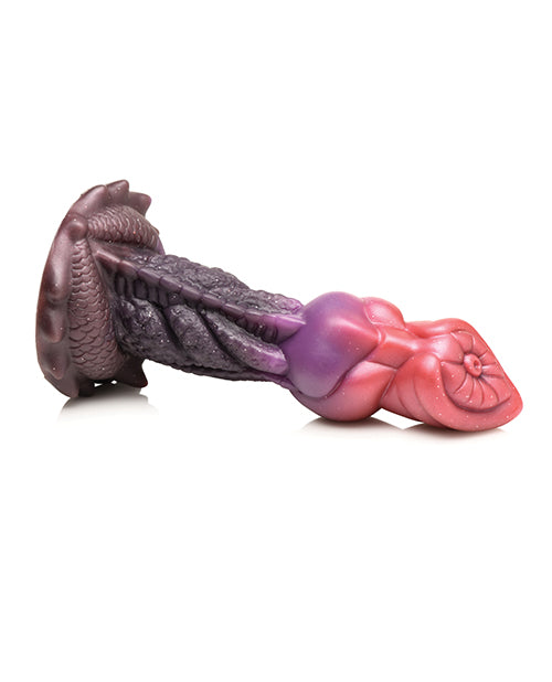 The Creature Cocks Deep Diver lays on its side, showcasing the firmness of the silicone. | Kinkly Shop