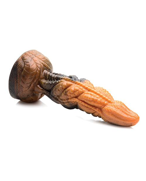 The Creature Cocks Ravager lays flat on horizontal surface. The dildo seems semi-firm, keeping its shape. | Kinkly Shop