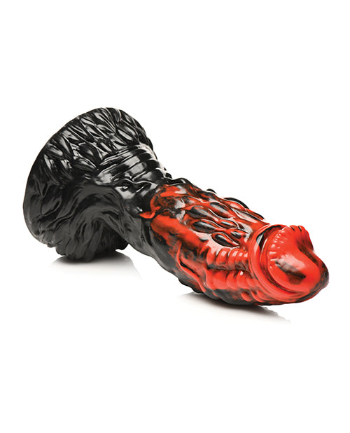 The Creature Cocks Vulcan Rod lays on its side. The "red" silicone coloration starts at the tip and looks like it "drips" down the shaft. | Kinkly Shop