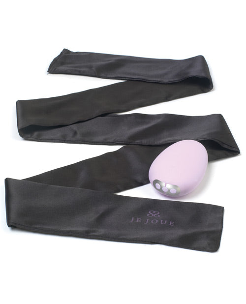 The Je Joue Mimi Soft in Lilac shown next to the included blindfold sash | Kinkly
