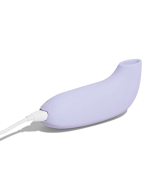 The base of the Dame Aer plugged into the charging cord that it comes with | Kinkly