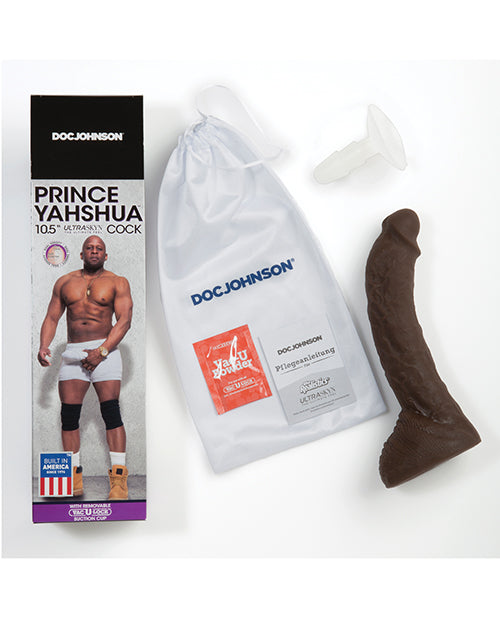 The Signature Cocks - Prince Yahshua shown next to everything it comes with. There's the dildo itself, the storage bag, Vac-U-Lock powder, and the Vac-U-Lock base. | Kinkly Shop