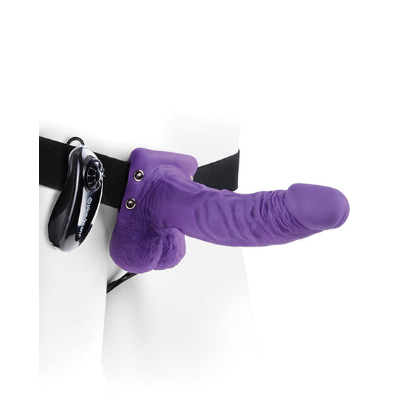 The Fetish Fantasy Series 7" Vibrating Hollow Strap On in Purple being worn on a mannequin | Kinkly