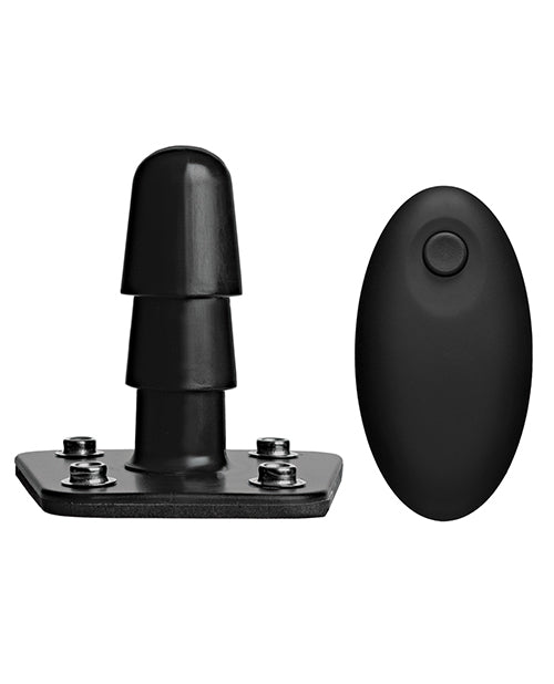 Close-up of the Vac-U-Lock vibrating attachment post shown next to a wireless remote to control the vibrations. | Kinkly