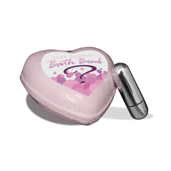 The Sexy Surprise Bath Bomb shown next to the bullet vibrator | Kinkly