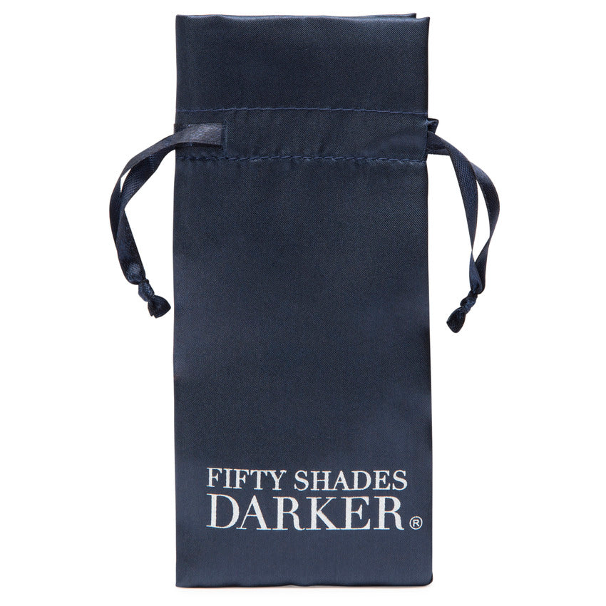 The drawstring bag that comes with the Fifty Shades "Just Sensation" Clitoral Clamp | Kinkly Shop