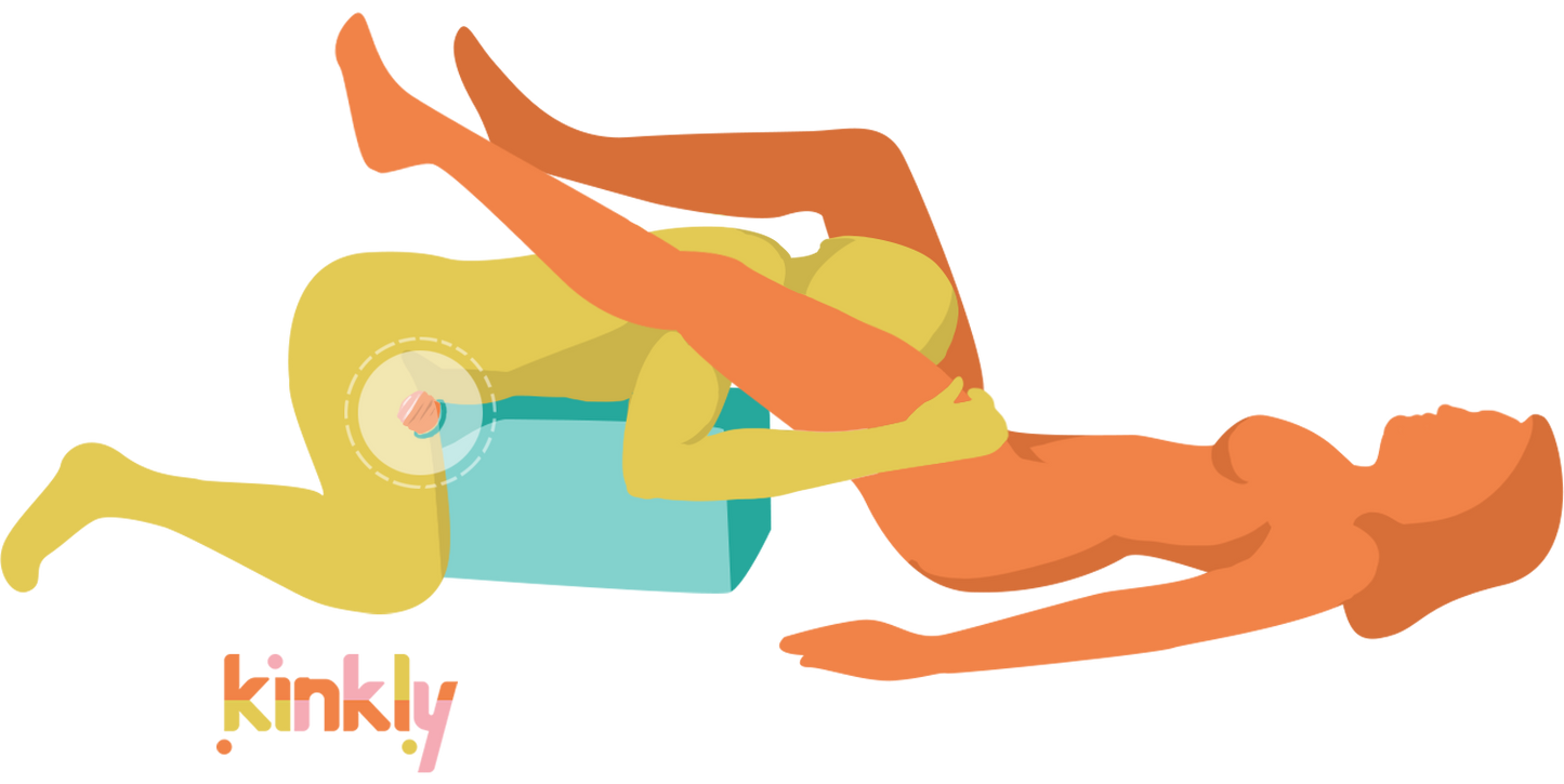 Illustration of two people using the Liberator On a Mission. One person is laying on top of the On a Mission, humping a Fleshlight inside of the sex toy mount. Their head is hanging off the top of the mount, between the legs of their partner who is laying on their back. They are using the penis stroker hands-free while providing oral sex totheir partner. | Kinkly Shop