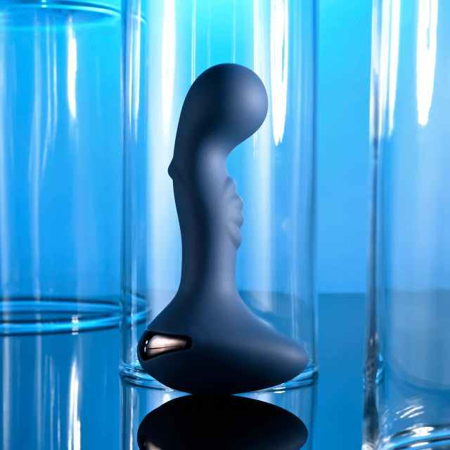 The Zero Tolerance Blue Oasis shown at a side profile. The vibrator has a broad, round head tip. | Kinkly Shop