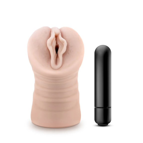 The Blush Ashley stroker shown next to the included bullet vibrator it comes with | Kinkly